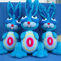 custom-manufactured stuffed blue bunnies